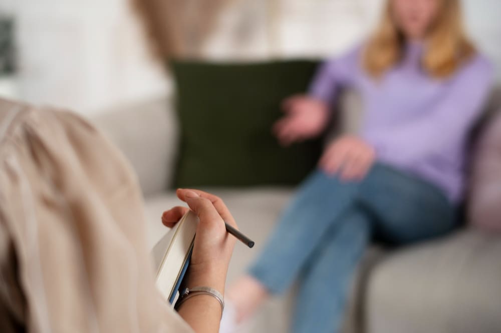 Young woman meets with a psychologist